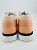 baskets chanel en tisssu et cuir de veau velours orange clair