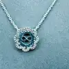 collier avec pendentif fleur orné d'un symbole infini et serti d'oxydes argent 925 millième (22 ct) 3,88g