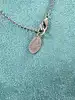 collier michal negrin fleurs pendantes