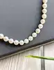 collier perles de culture avec fermoir boule en or  or 750 millième (18 ct) 19,82g