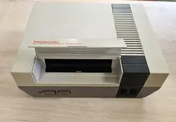 console nintendo entertainment system nes avec une manette