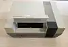 console nintendo entertainment system nes avec une manette