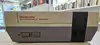 console nintendo entertainment system nes avec une manette