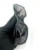 lunettes de soleil chanel 5127-b camélia strass monture noire et verres marron