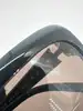 lunettes de soleil chanel 5127-b camélia strass monture noire et verres marron
