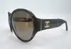 lunettes de soleil chanel 5229q écaille branches cuir & logo cc verres polarizés