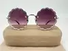 lunettes de soleil chloé rosie ce142s monture dorée et verres violet dégradé
