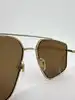 lunettes de soleil gucci gg0941s-003 en métal doré et verres marrons