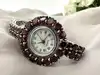 montre bracelet vintage en argent et grenats naturels, cadran nacre, mouvement quartz  argent 925 millième (22 ct) 44,91g