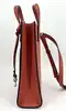 petit sac cabas marc jacobs en cuir grainé orange avec bandoulière amovible et réglable