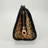 pochette marc by marc jacobs en toile rayé noir et beige