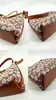 sac coach juliet 25 en tissu jacquard textile signature avec deux bandouliàres