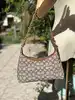 sac coach juliet 25 en tissu jacquard textile signature avec deux bandouliàres