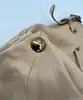 sac seau gérard darel en cuir de chèvre beige