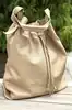 sac seau gérard darel en cuir de chèvre beige