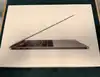 apple macbook pro 13.3' touch bar 256 go ssd 8 go ram intel core i5 quadricœur à 1.4 ghz gris sidéral 2019