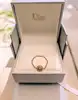 bague souple dior rose des vents en or jaune et nacre or 750 millième (18 ct) 1,08g