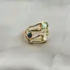 bauge milti-rangs en métal doré ornée d'oxydes bleu, pierre de lune et labradorite