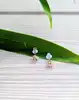boucle d'oreilles puces chacune sertie d'une pierre rose en forme d'étoile or 750 millième (18 ct) 0,29g