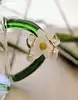 boucles d'oreilles dormeuses chacune ornée d'une perle de culture forme ovale  or 750 millième (18 ct) 2,16g