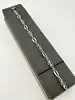 bracelet des maillons ovales lisses et des motifs ajourés en filigrane argent autre 4,99g