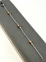 bracelet fin en argent avec petites perles crème et goldstone cuivrée argent autre 1,55g