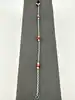 bracelet fin en argent avec petites perles crème et goldstone cuivrée argent autre 1,55g