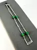 bracelet orné de billes vertes et de maillons allongés argent autre 2,06g