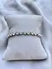 bracelet swarovski tennis en metal argenté et orné de cristaux ronds