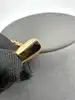 collier louis vuitton essential v en laiton à finition dorée