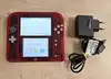 console nintendo 2ds rouge transparent inclus pokemon red version