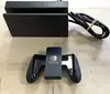 console nintendo switch avec joy con bleu et rouge