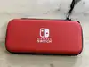 console nintendo switch avec joy con bleu et rouge