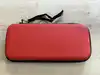 console nintendo switch avec joy con bleu et rouge