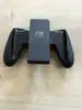 console nintendo switch avec joy con bleu et rouge