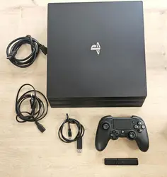 console sony playstation 4 ps4 pro 1to noire avec une manette