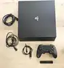console sony playstation 4 ps4 pro 1to noire avec une manette