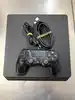 console sony playstation 4 ps4 slim 500go noire avec une manette