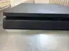 console sony playstation 4 ps4 slim 500go noire avec une manette