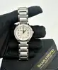 montre baume & mercier linea 65616 avec une lunette ornée de diamants et mouvement quartz, bracelet en acier