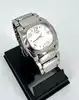 montre tissot t009310a t moments, mouvement quartz avec bracelet en acier