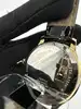 montre tissot t063610a, mouvement quartz, cadran noir, boîtier doré et bracelet en cuir noir
