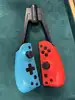 paire de joycons bleu rouge non officielle