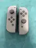 paire manette joycon switch gris officielle