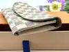 portefeuille louis vuitton emilie en toile damier azur