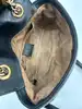 sac à bandoulière gucci gg marmont mini matelassé en cuir souple noir avec bijouterie dorée