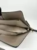 sac chloé faye en cuir bi matière taupe et beige avec une bandoulière non d'origine