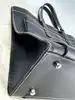 sac just campagne en cuir noir