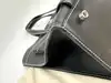 sac just campagne en cuir noir