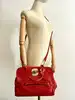 sac longchamp gatsby en cuir rouge embossé façon python